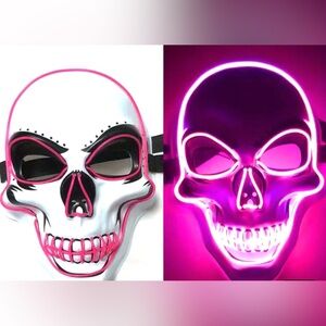 NEW HALLOWEEN MASK SKELETON. LIGHTS UP PINK. FITS KIDS AND ADULTS